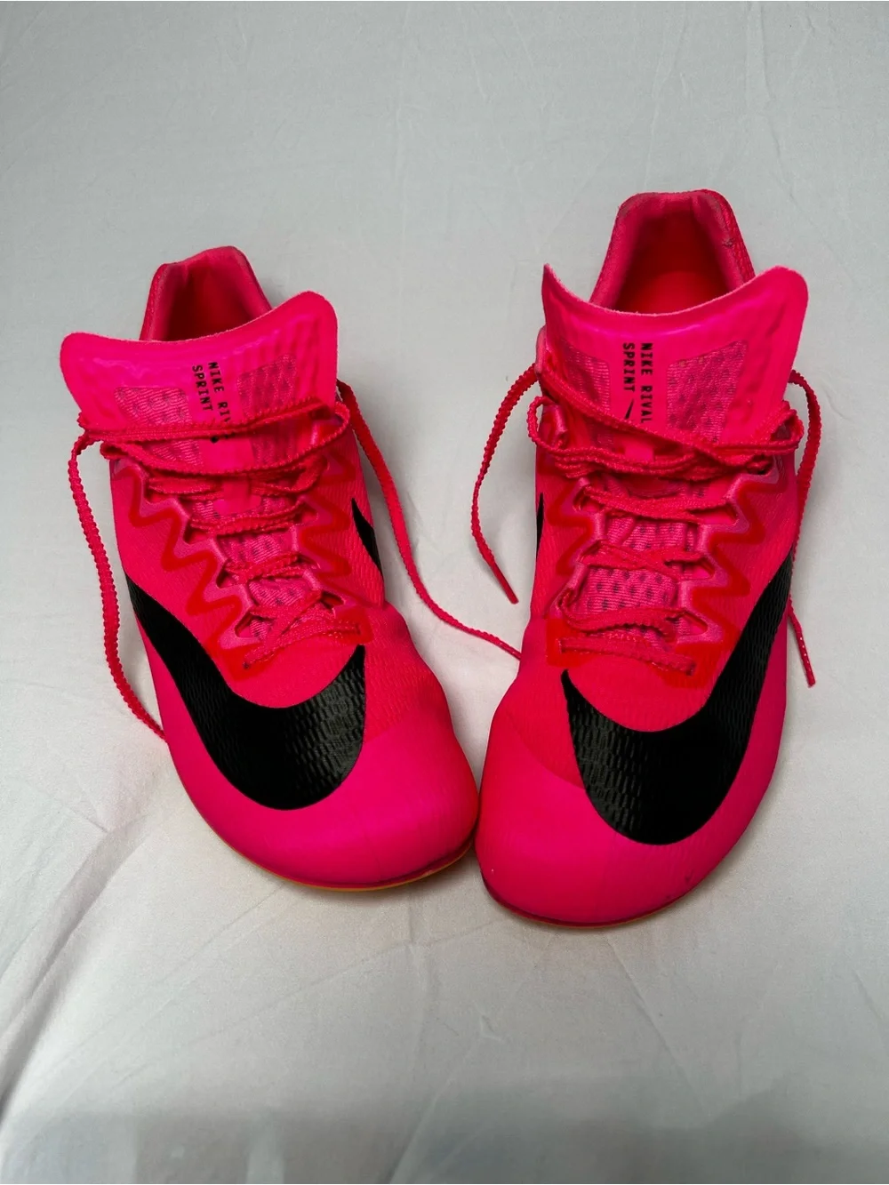 Nike Bright Pink Athletic track with Black Swoosh men’s 10/1/2
